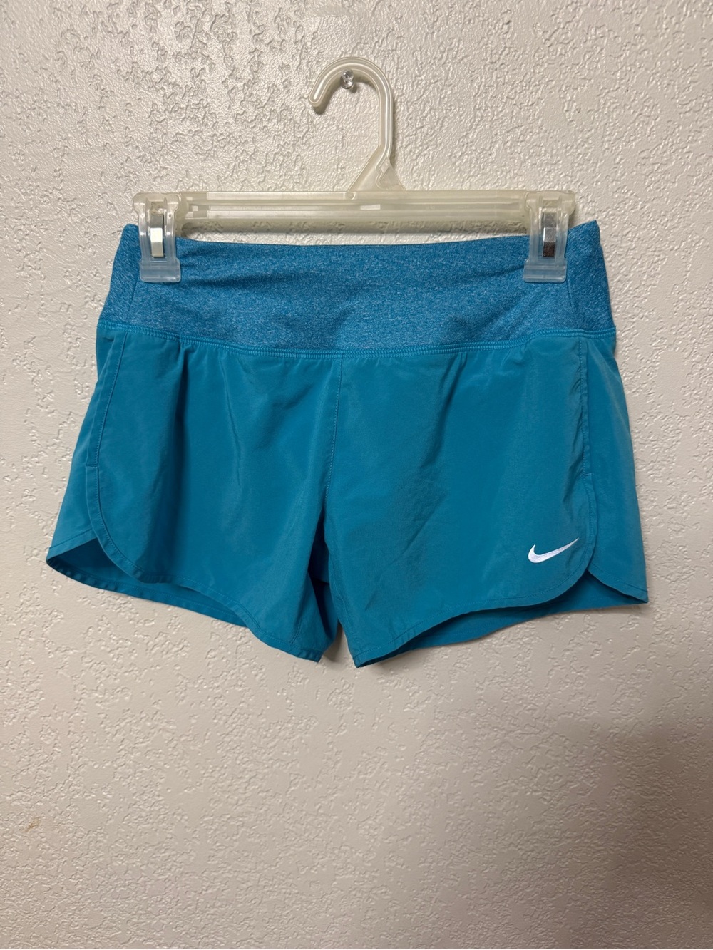 Nike Women's Teal Athletic Running Shorts with Branded Swoosh